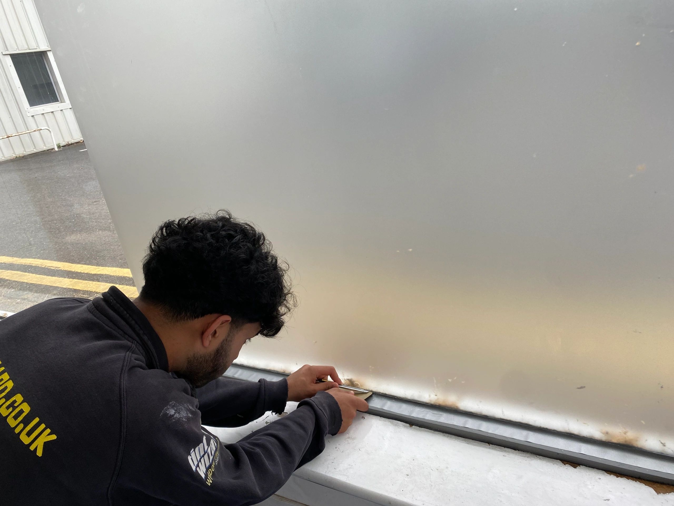 Technician working on building