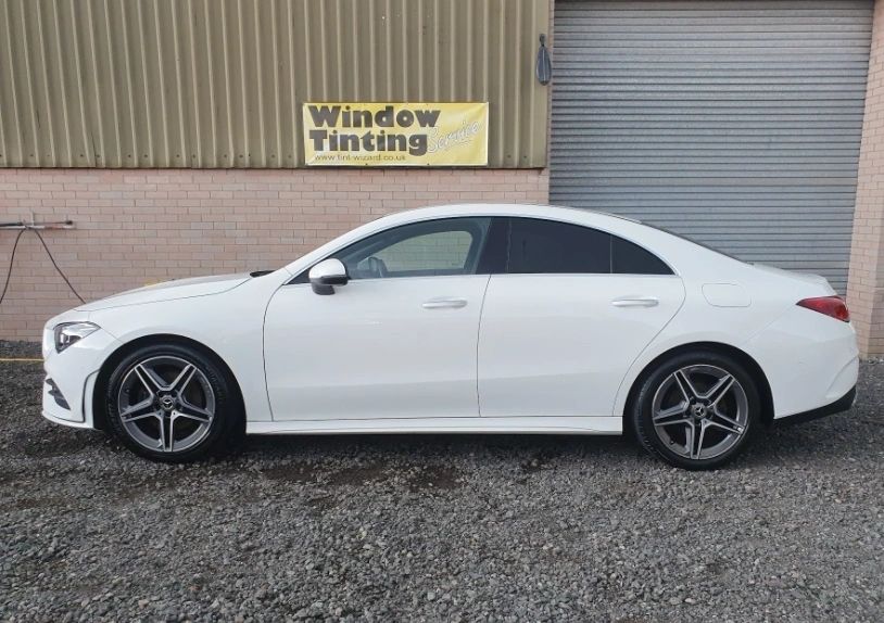 White Mercedes with tinted windows
